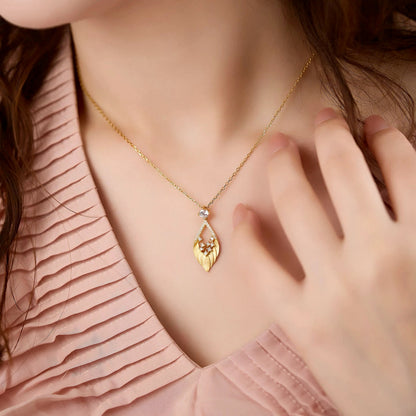 Golden Feather Pendant Necklace